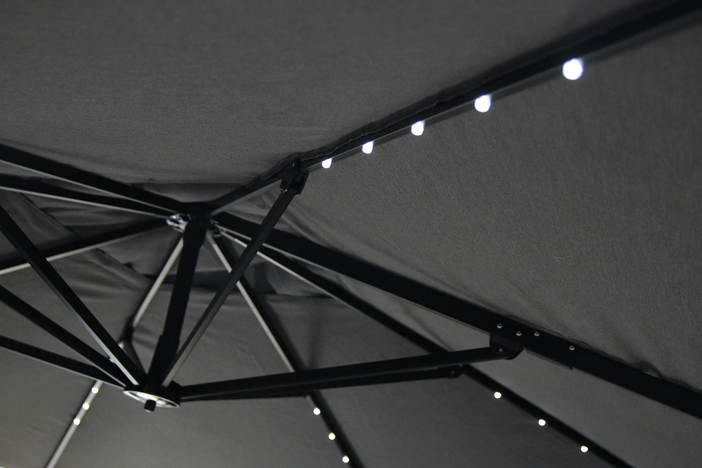 Solar Cantilevered Patio Umbrella - 137"W x 84"H, Steel, Hand Crank, Built-in LED Lights - Grey|Parasol excentré Solar pour la terrasse, 137 po (L) x 84 po (H), acier, manivelle, éclairage à DEL intégré - gris